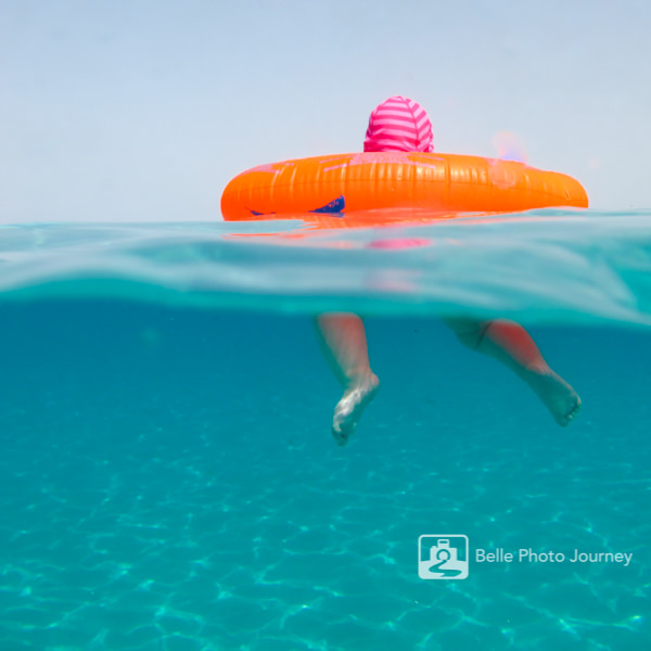 baby swimming in ocean holiday photo